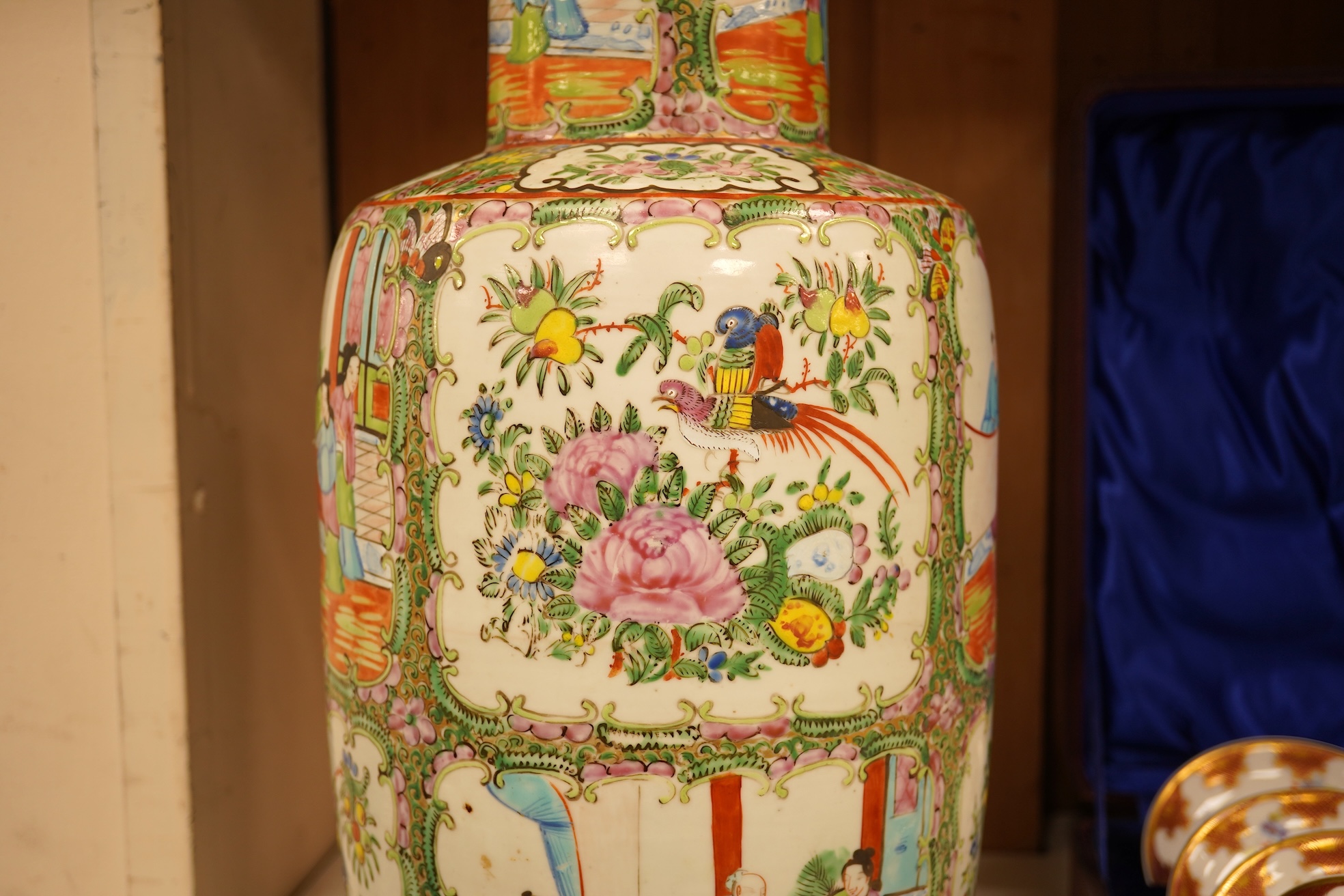 A 19th century Chinese famille rose baluster vase enamelled with flowers and figures, 44cm high